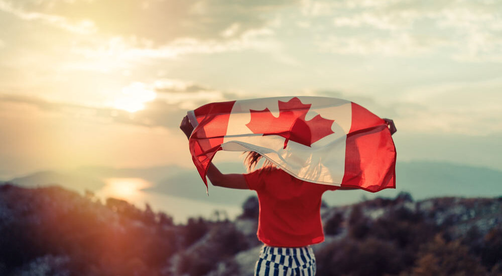 girl-carrying-canadian-flag