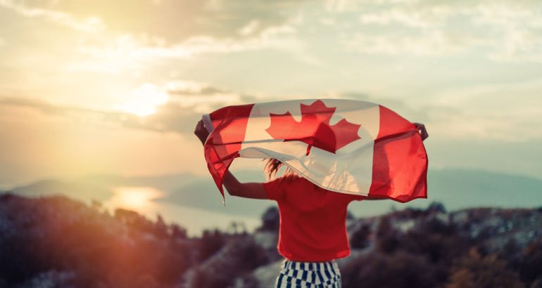 girl-carrying-canadian-flag