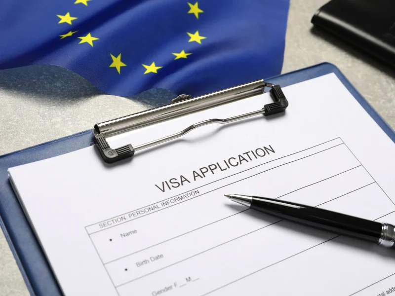 visa-application-form-pen-and-flag-of-european-un-2026-01-27-18-15-50-utc